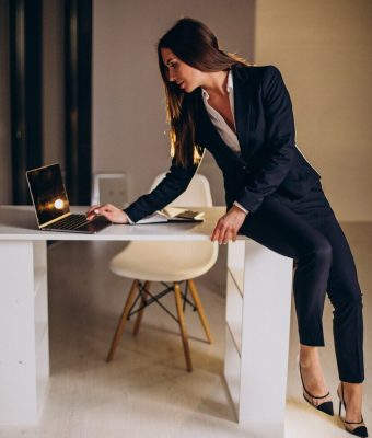 business-woman-working-late-night-office_1303-27100